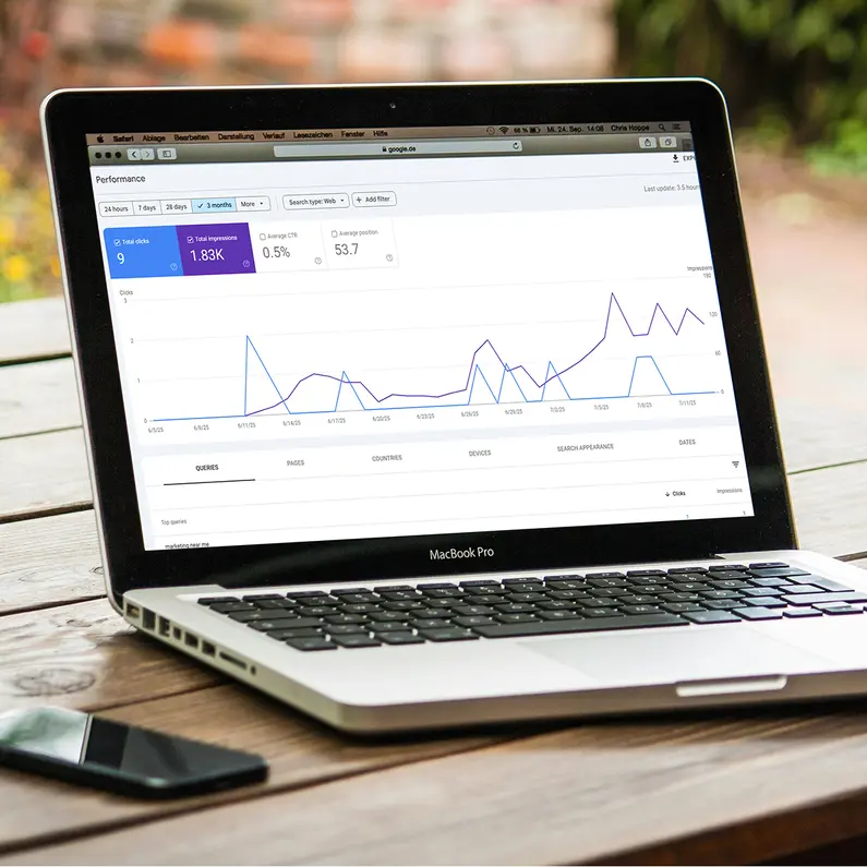Analytics graph on laptop screen representing SEO performance