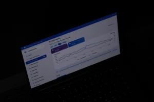 Bing Webmaster Tools AI Performance dashboard showing citation metrics and trend graph on laptop screen